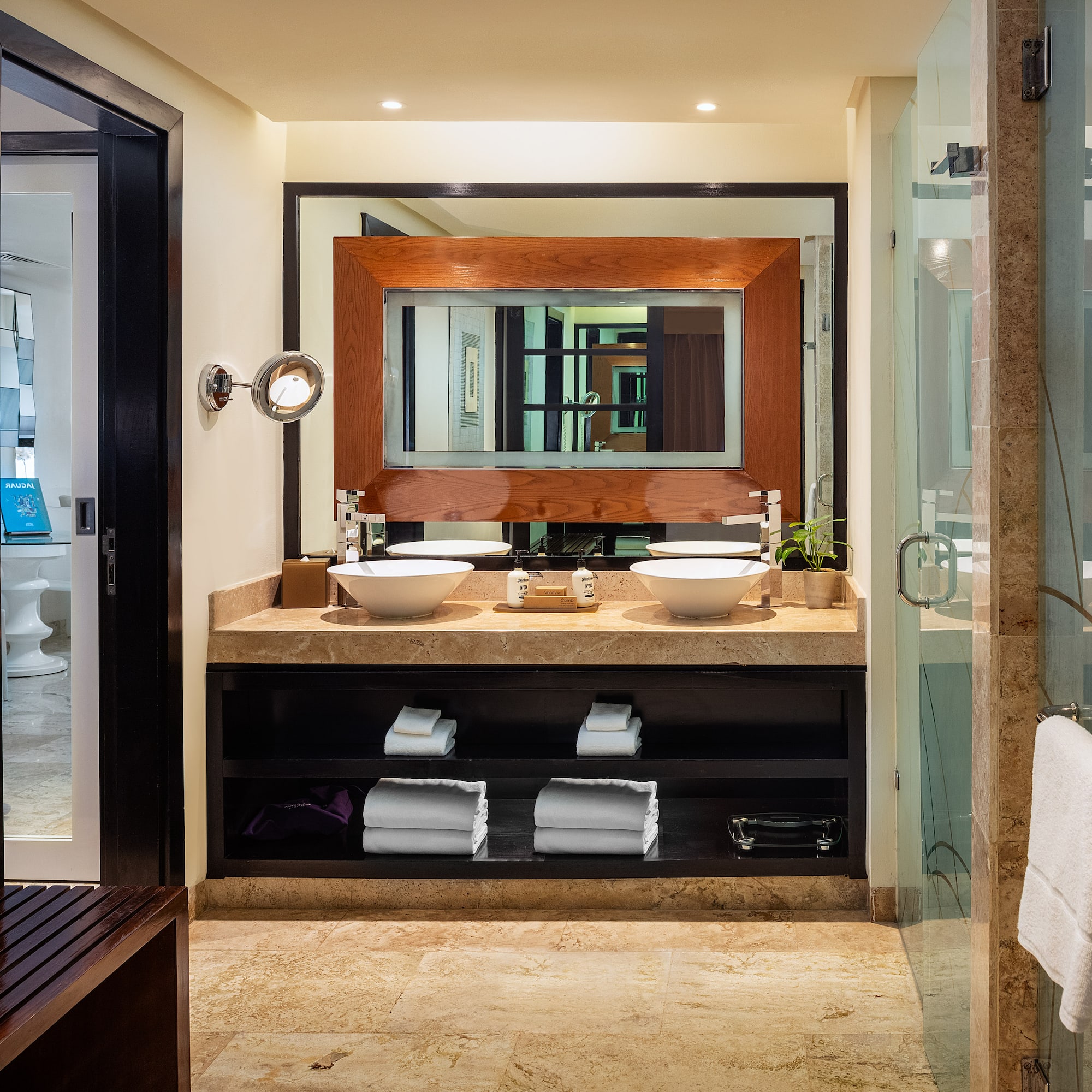 a bathroom with a mirror and sink