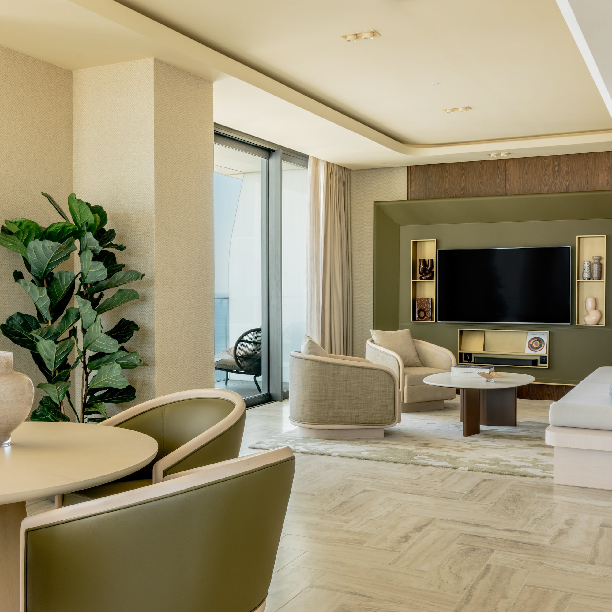 a living room with a television and a table