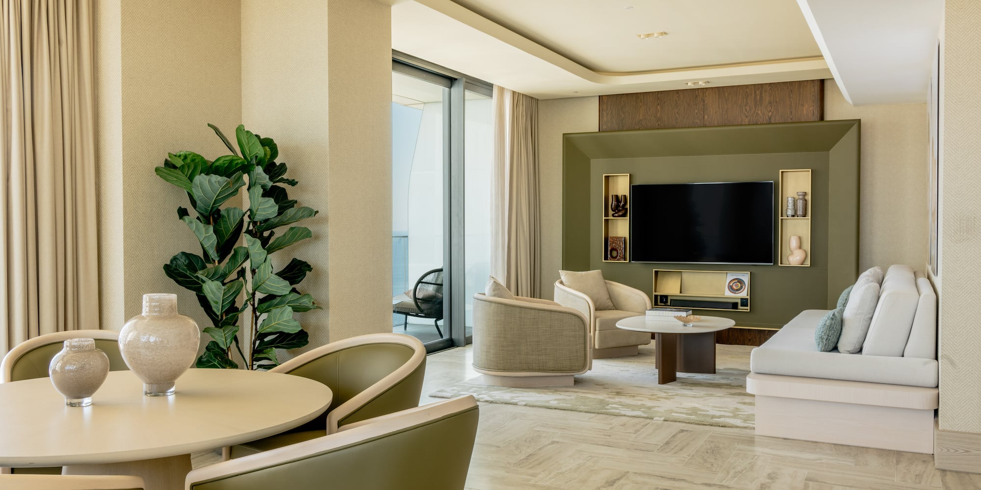 a living room with a television and a table