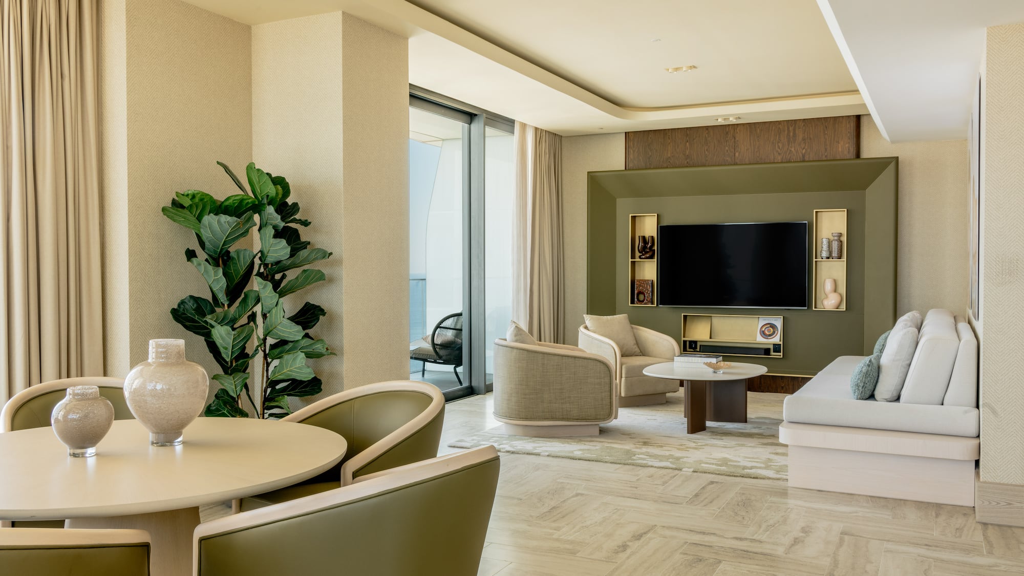 a living room with a television and a table