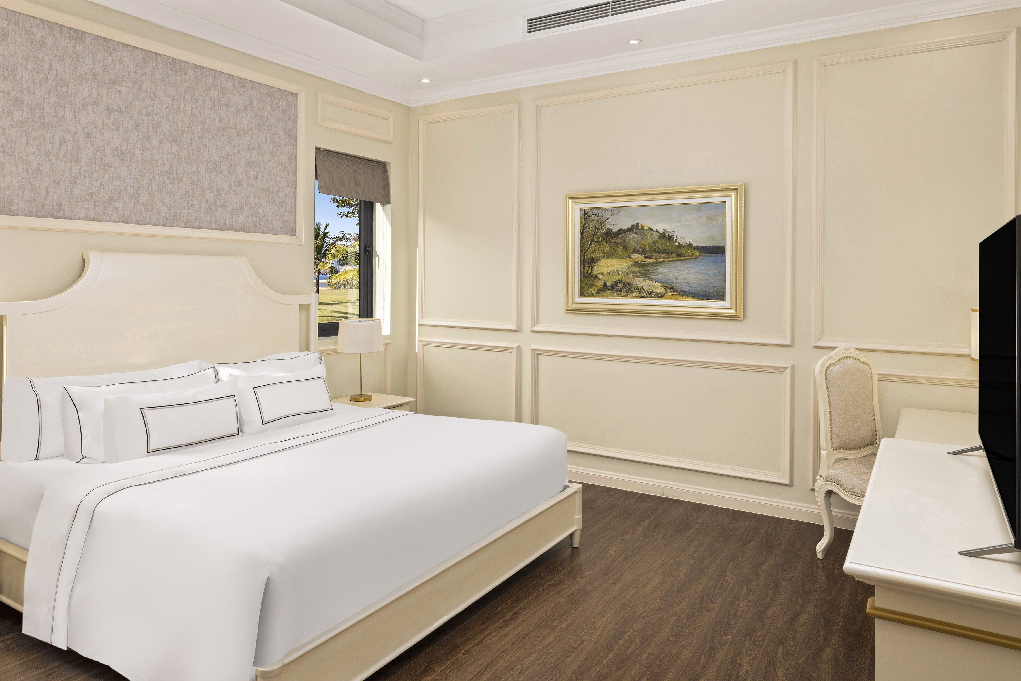 a bedroom with a bed and a chair