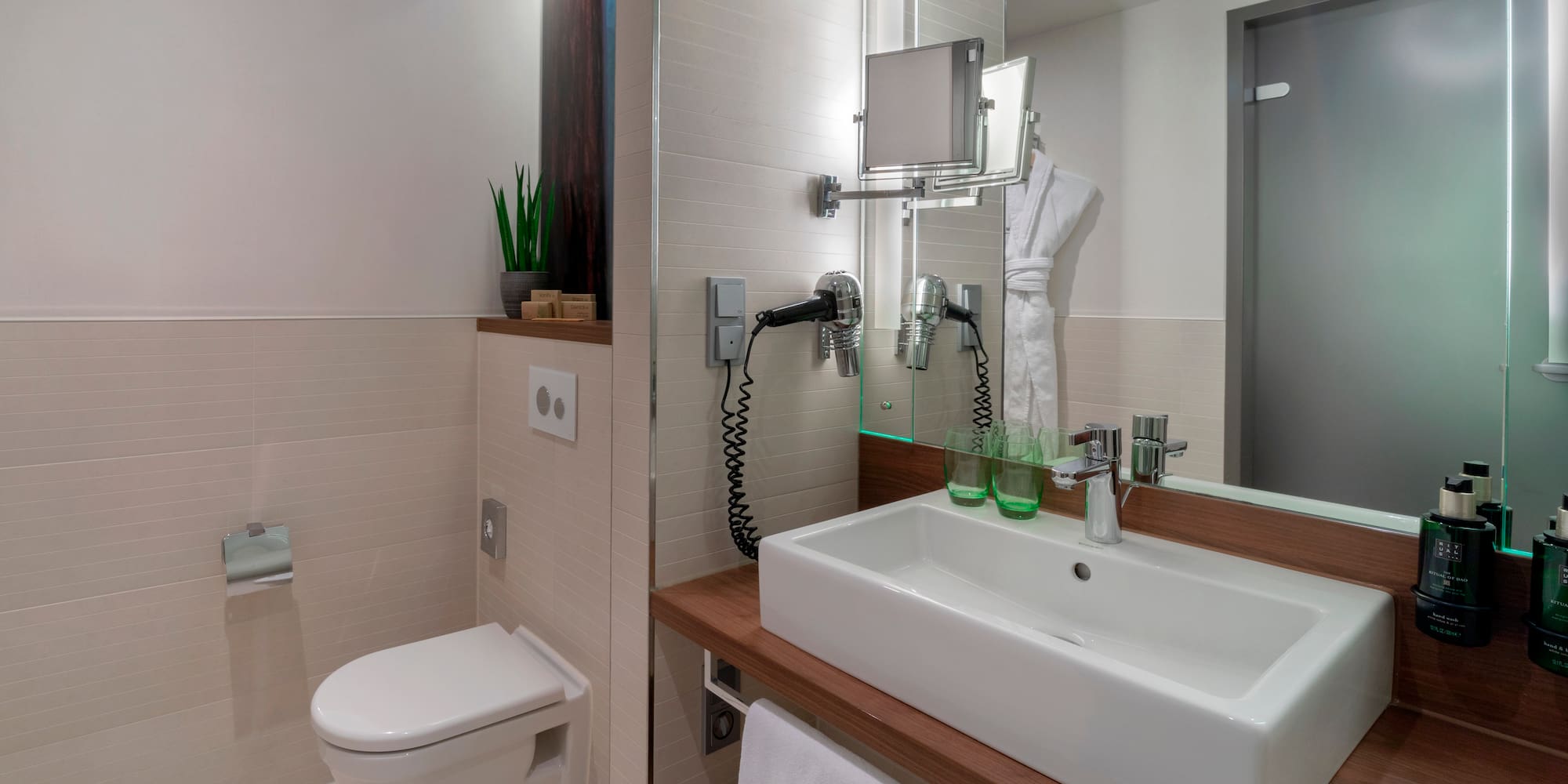 a bathroom with a sink and toilet