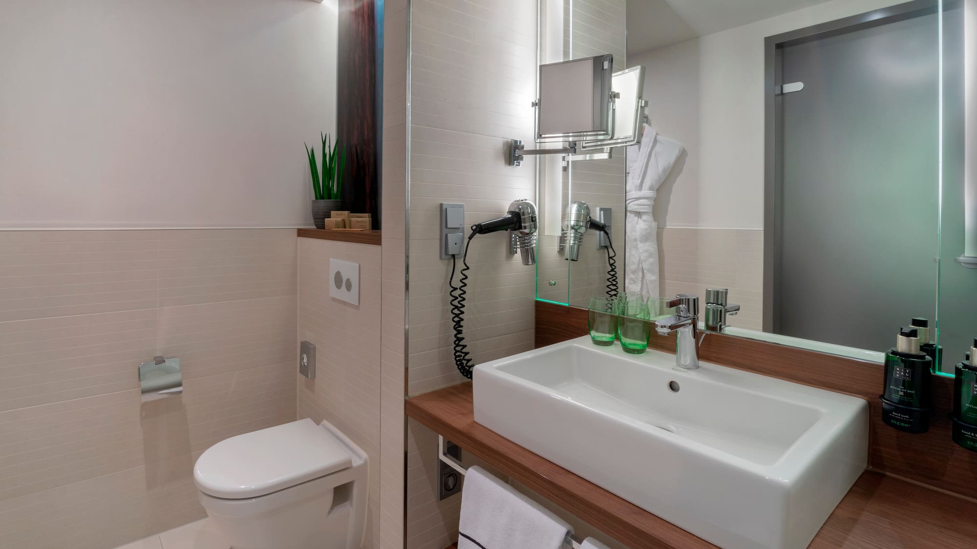 a bathroom with a sink and toilet