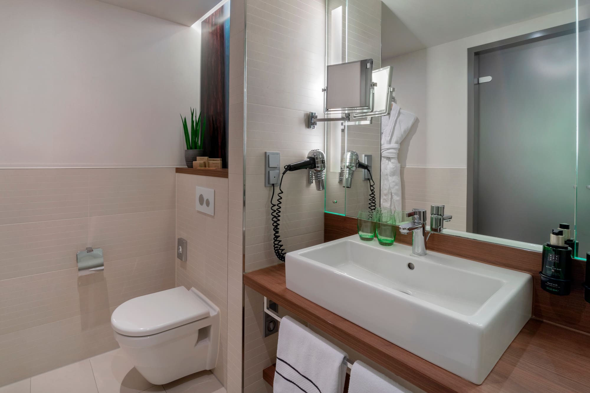 a bathroom with a sink and toilet