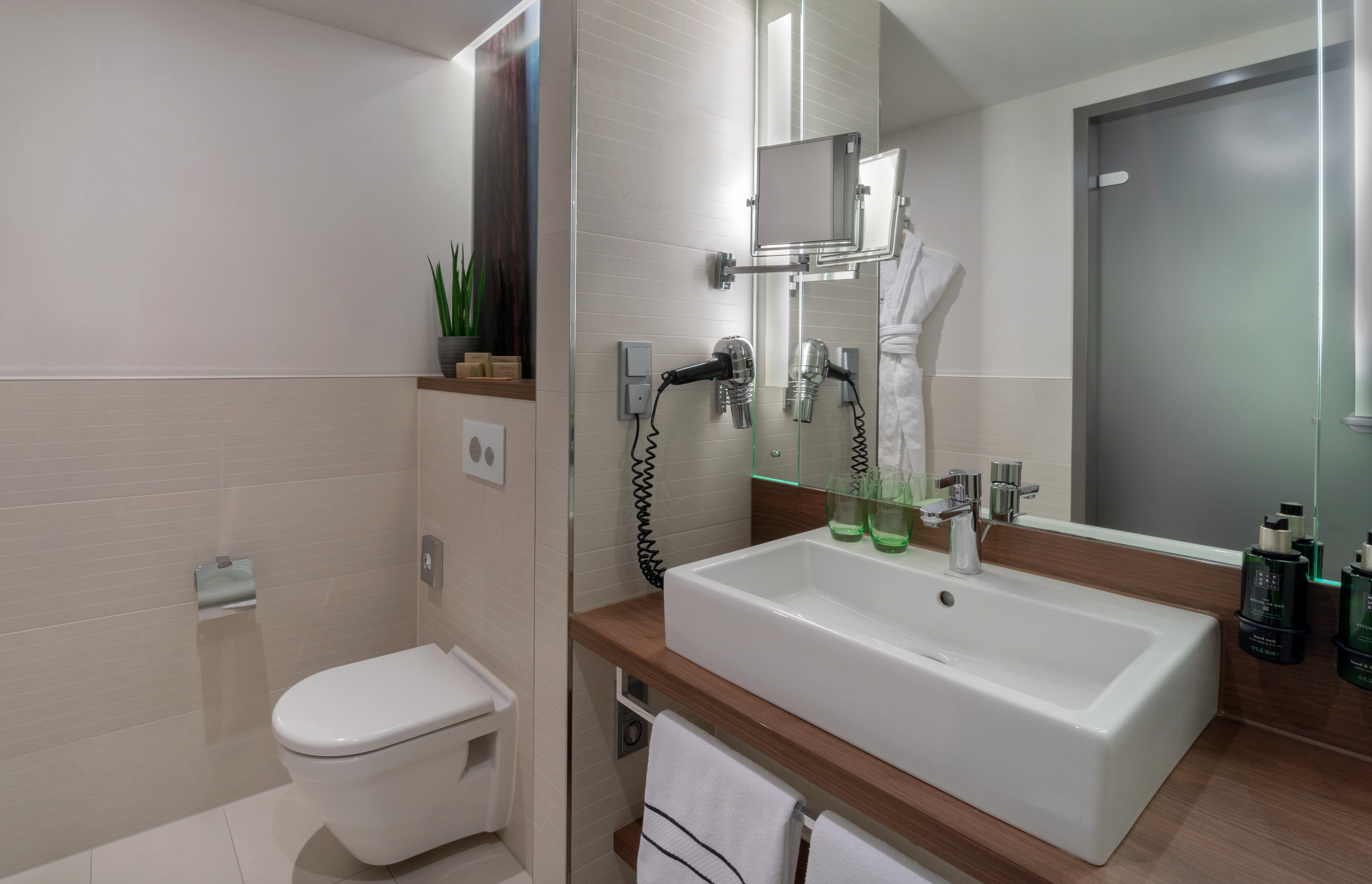 a bathroom with a sink and toilet