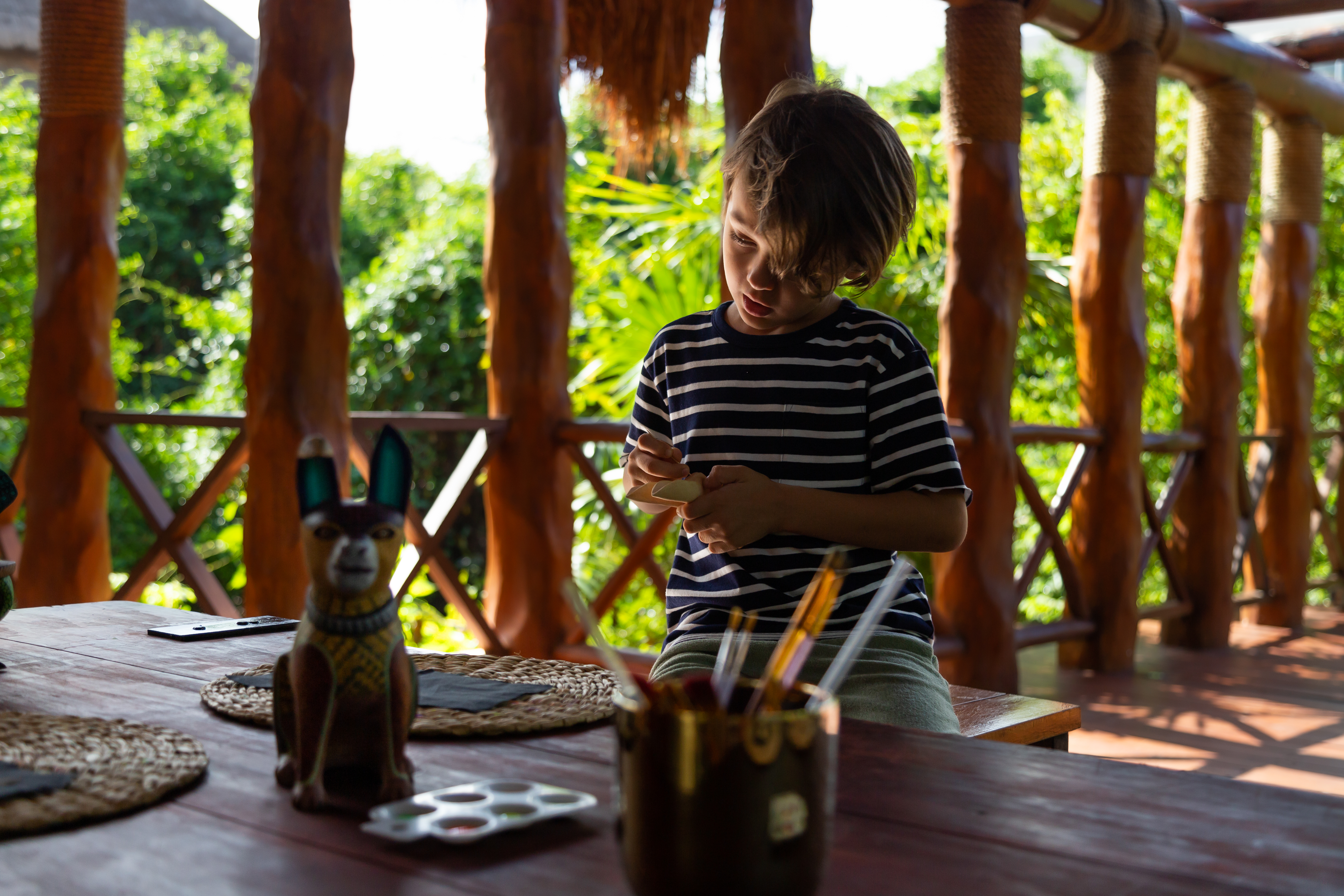 a boy playing with a toy