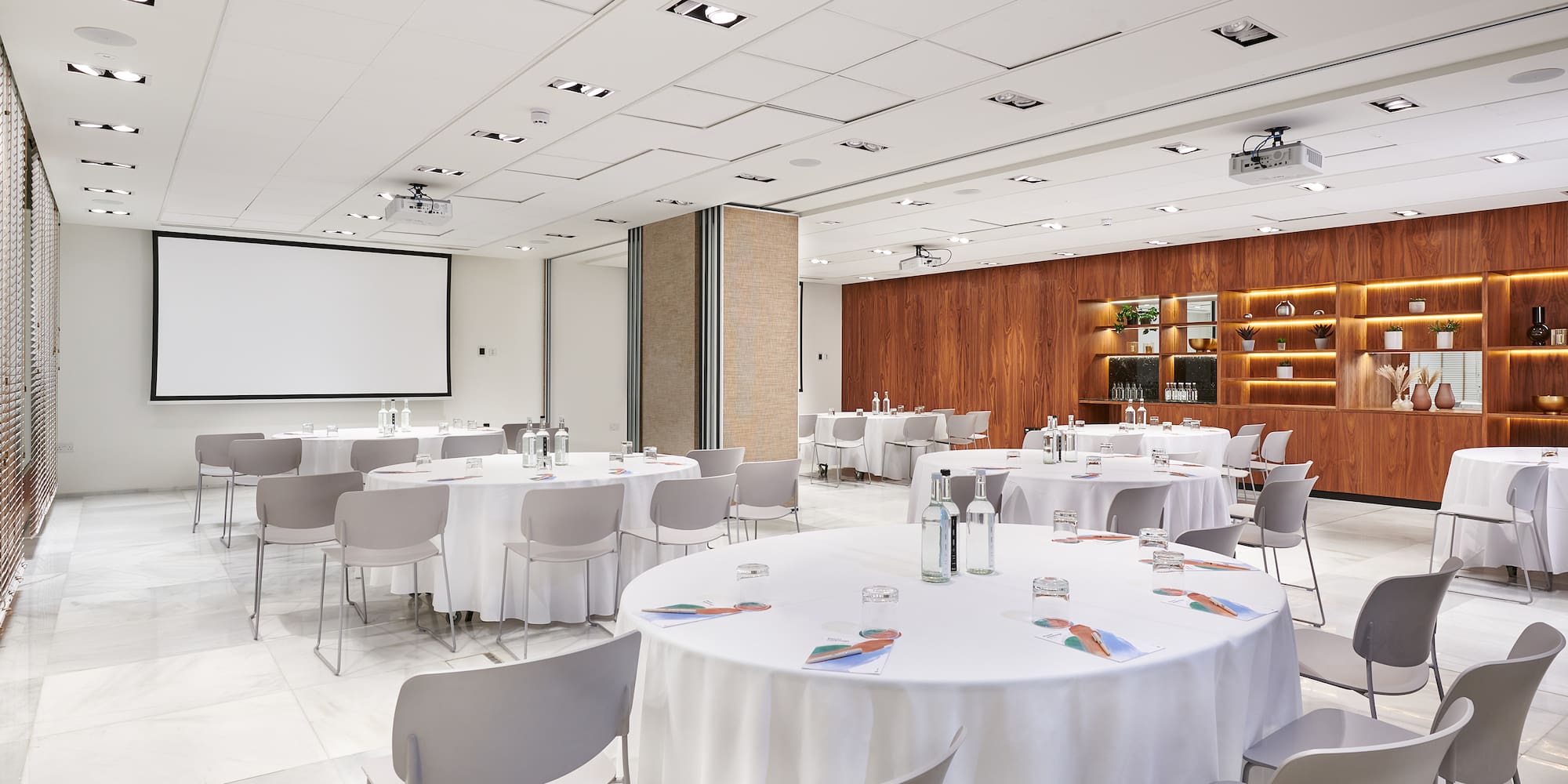 a room with tables and chairs