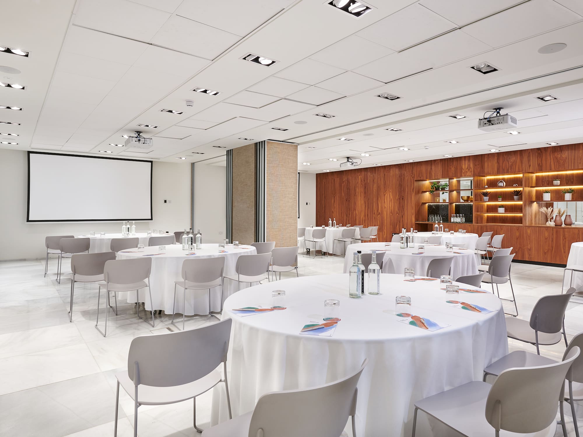 a room with tables and chairs