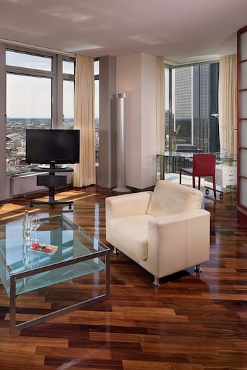a living room with a tv and a couch