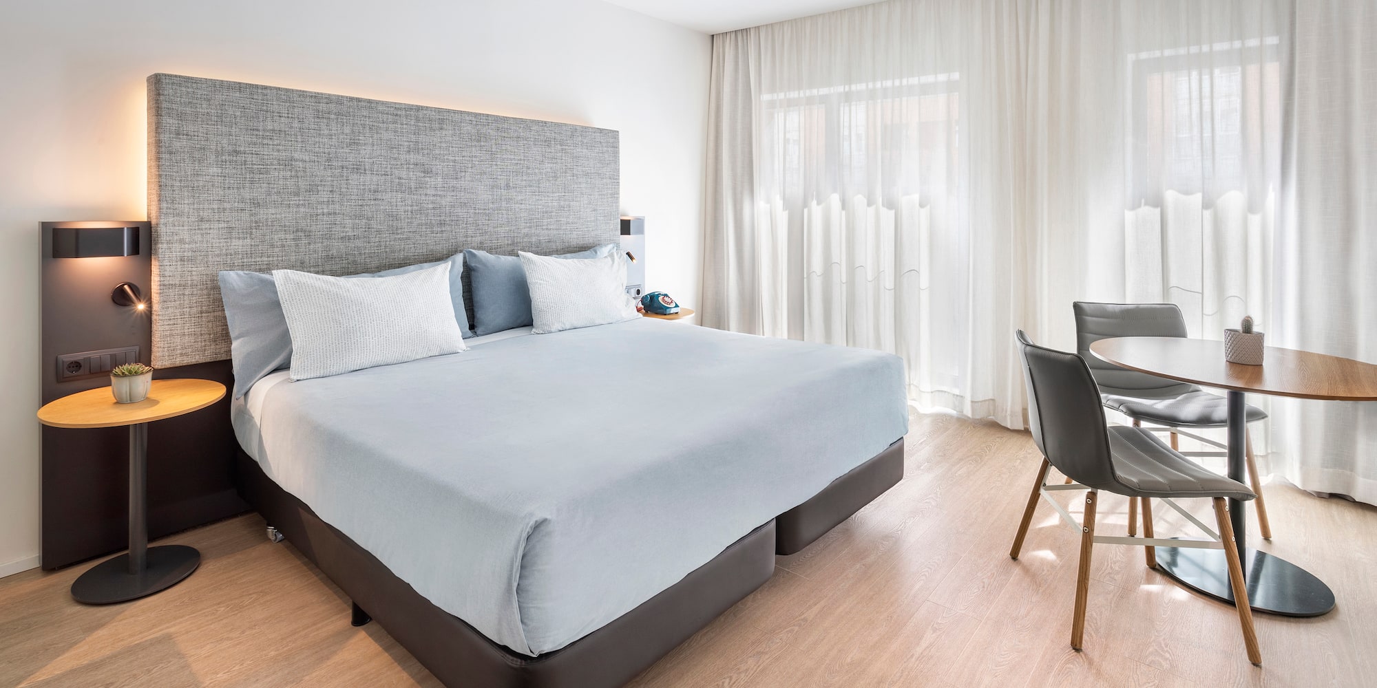 a bed and a table in a room