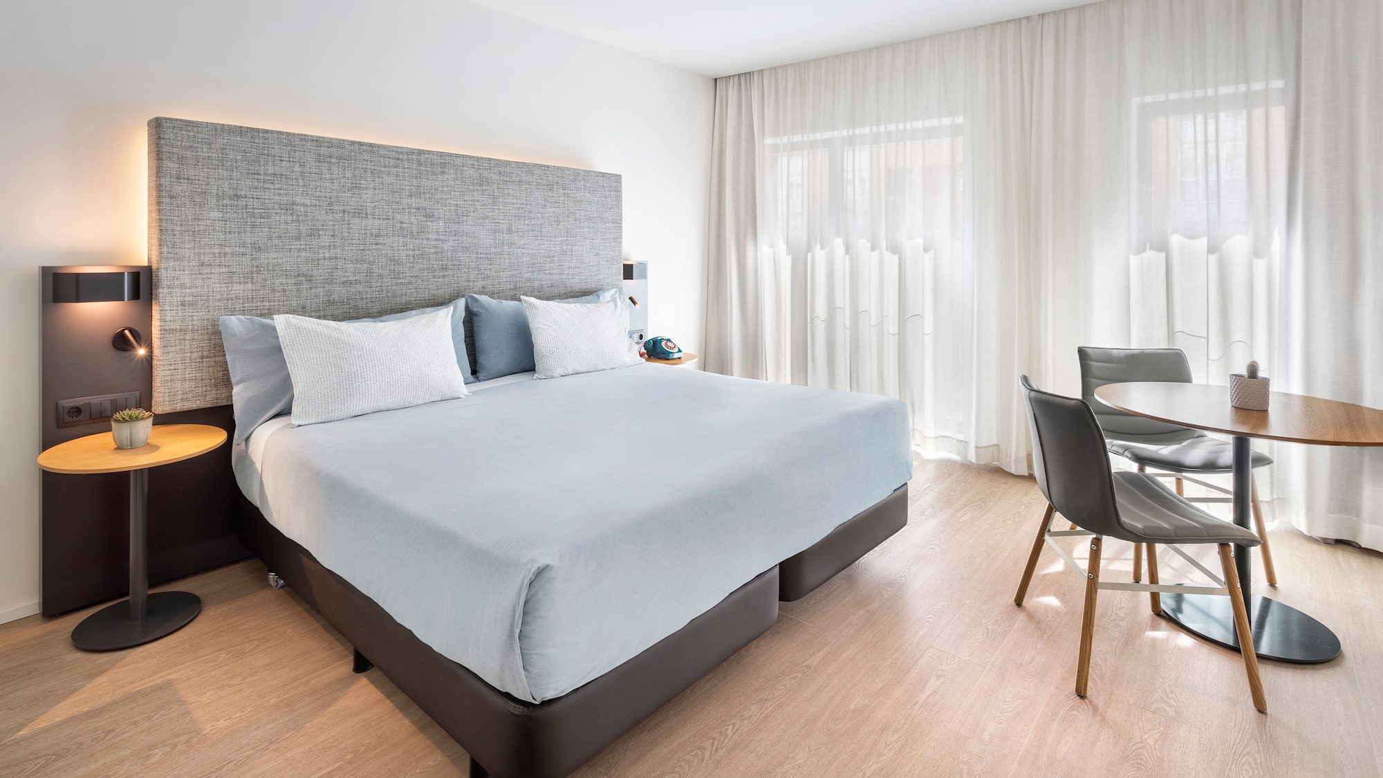 a bed and a table in a room