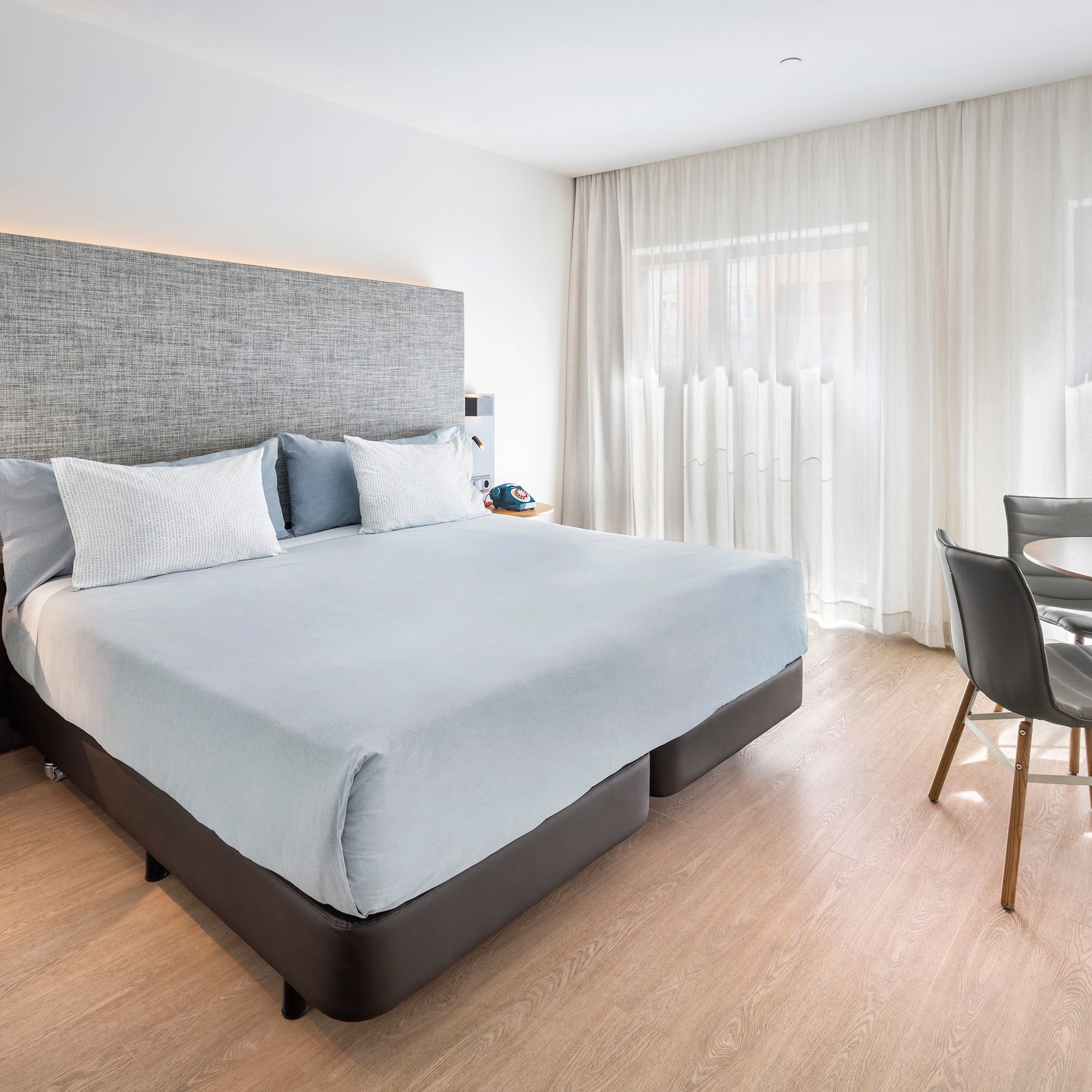 a bed and a table in a room