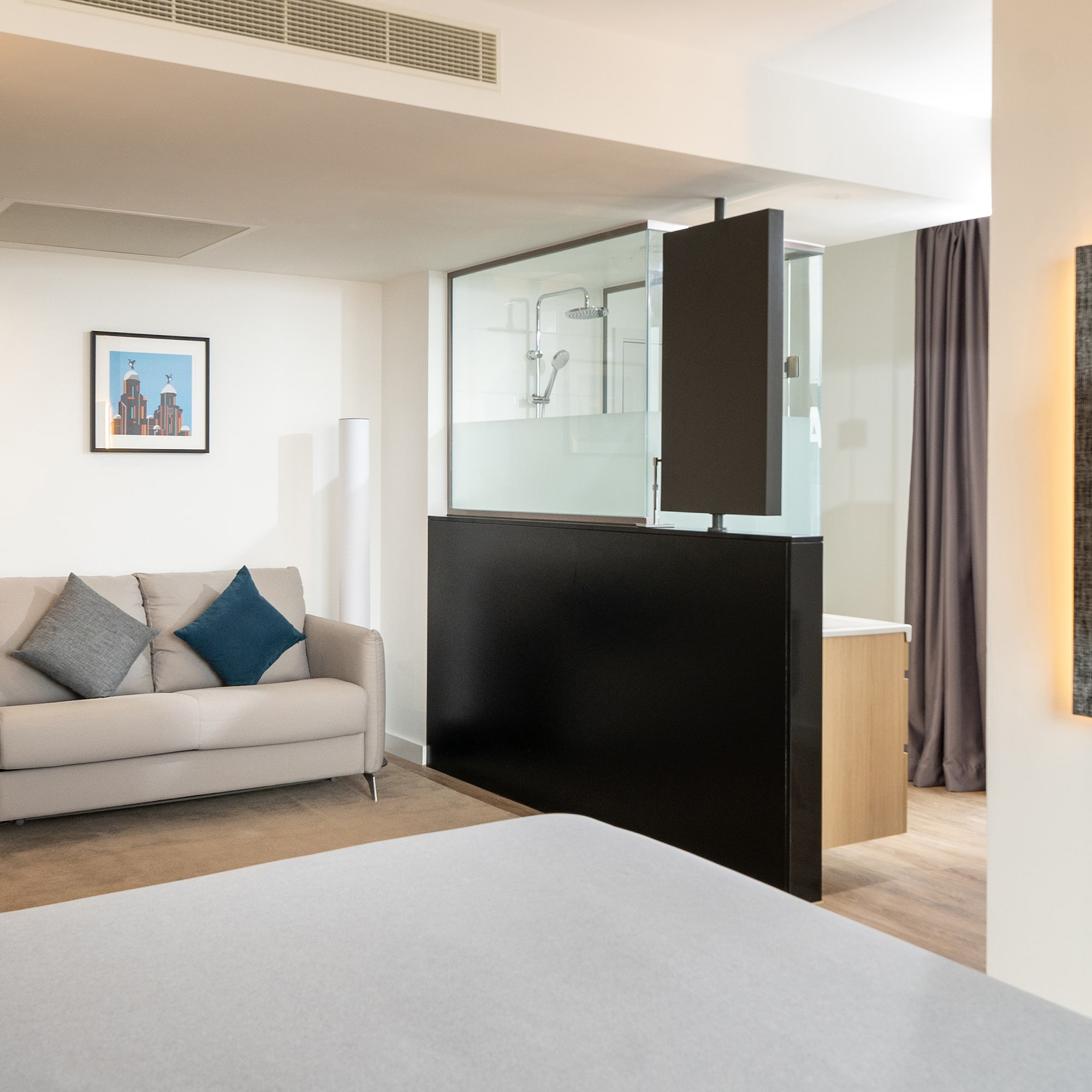 a room with a bed and a couch