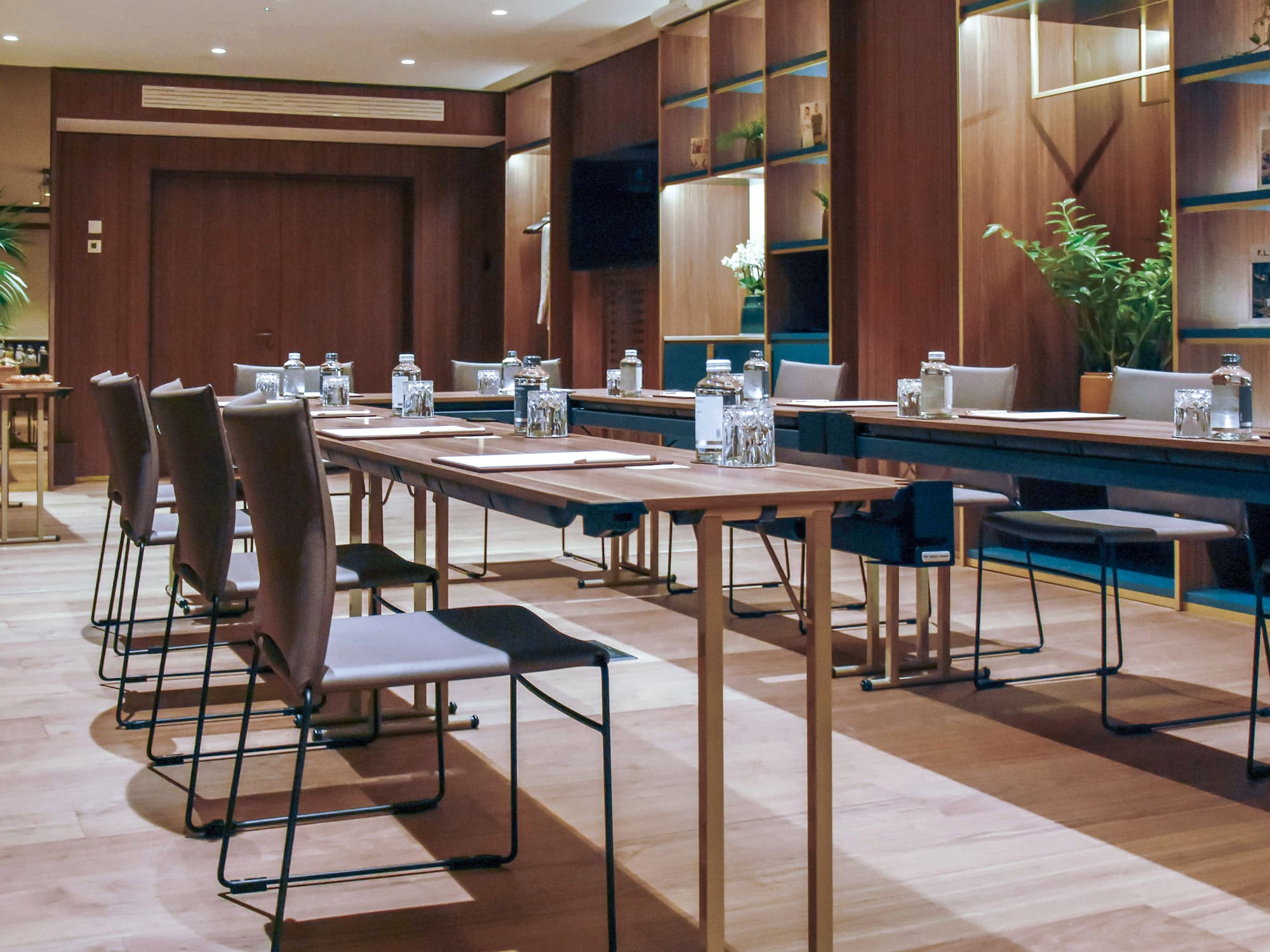 a room with tables and chairs.