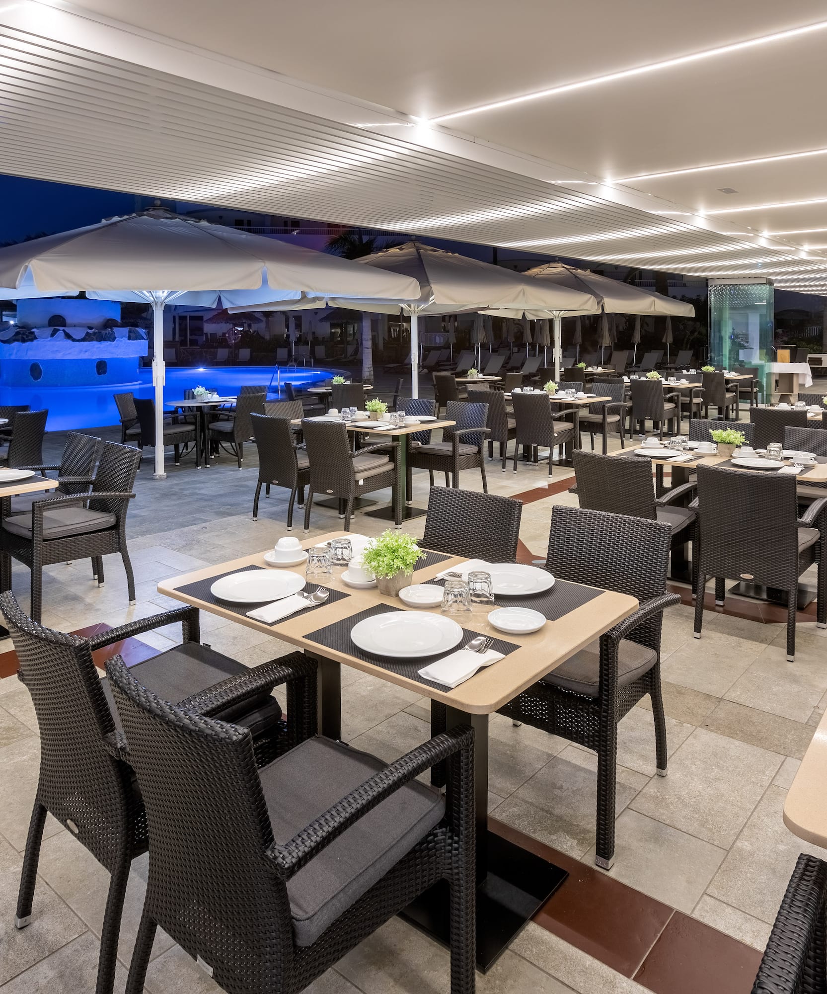 a restaurant with tables and chairs