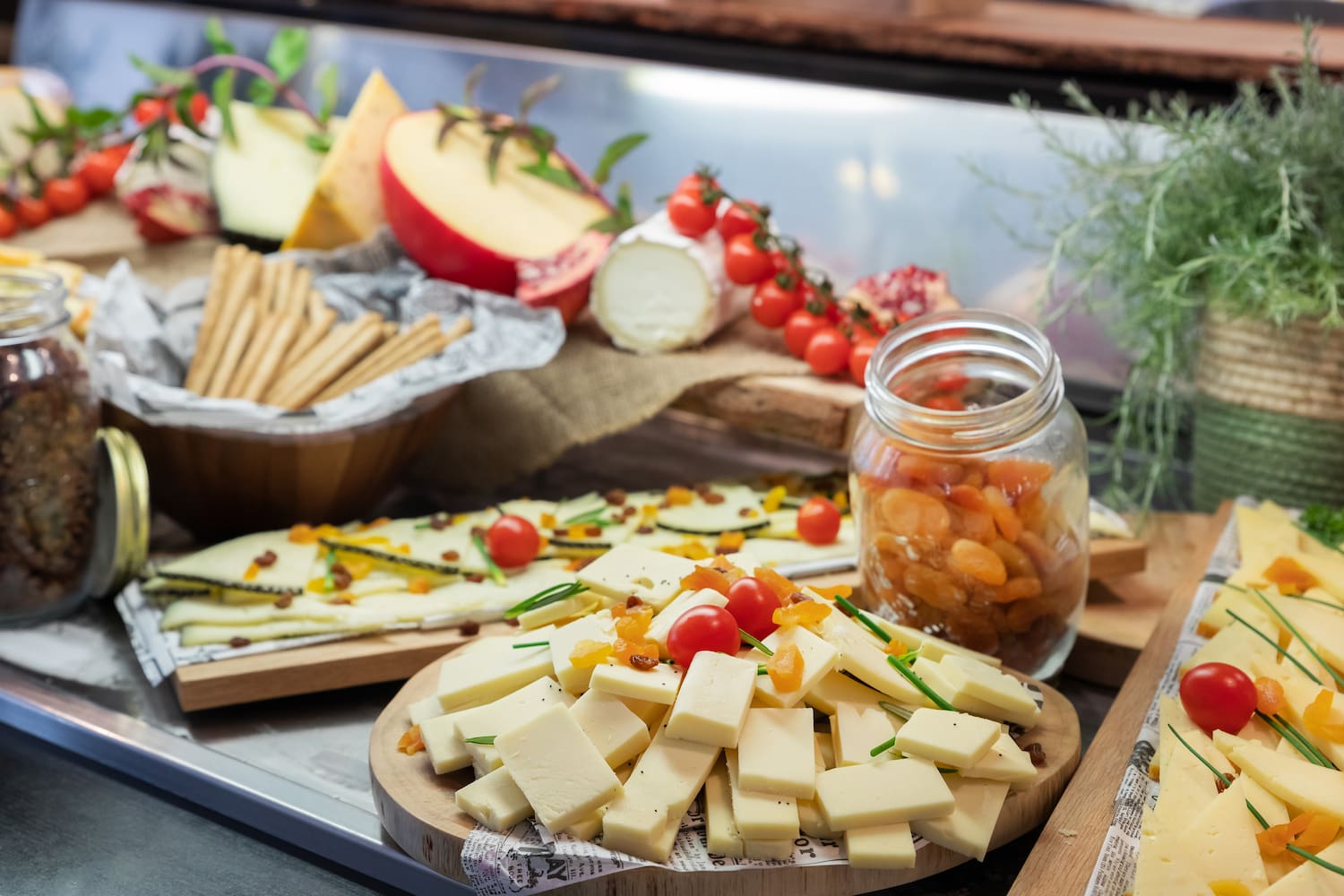 a plate of cheese and fruit