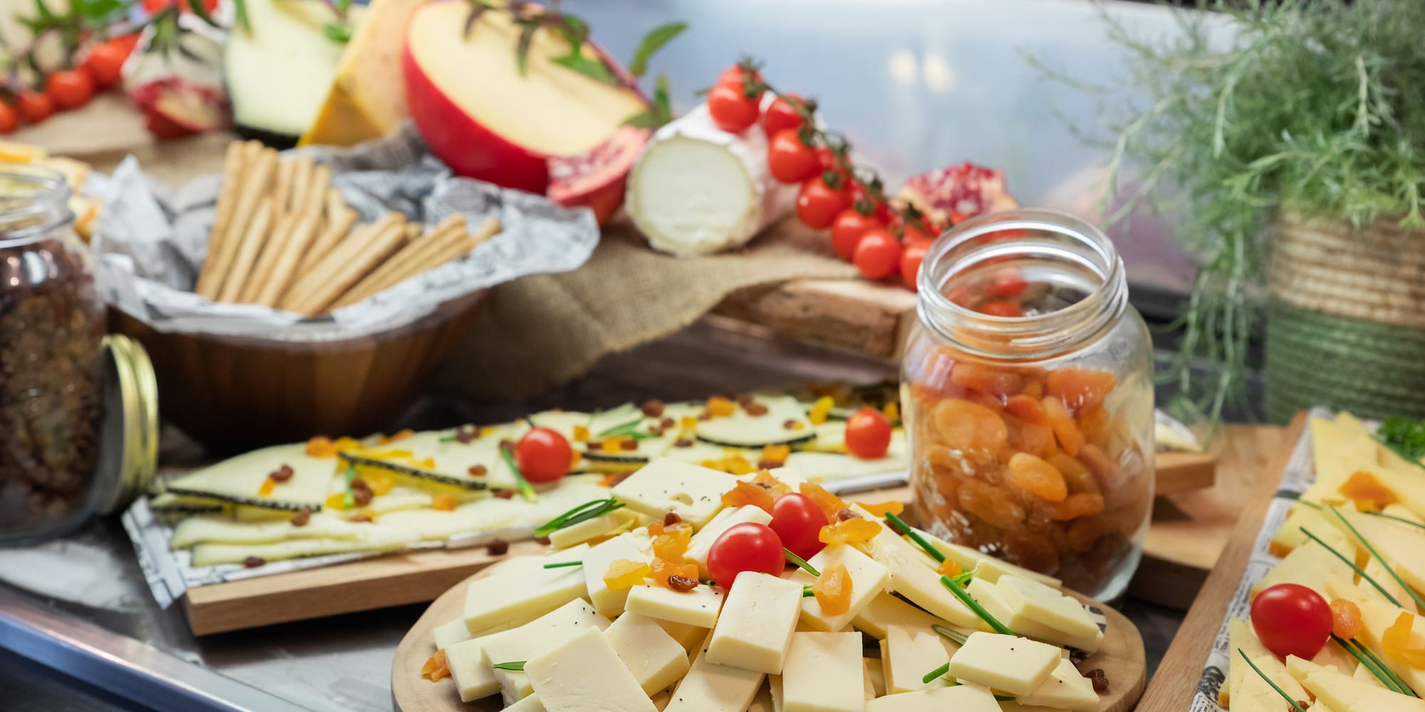 a plate of cheese and fruit