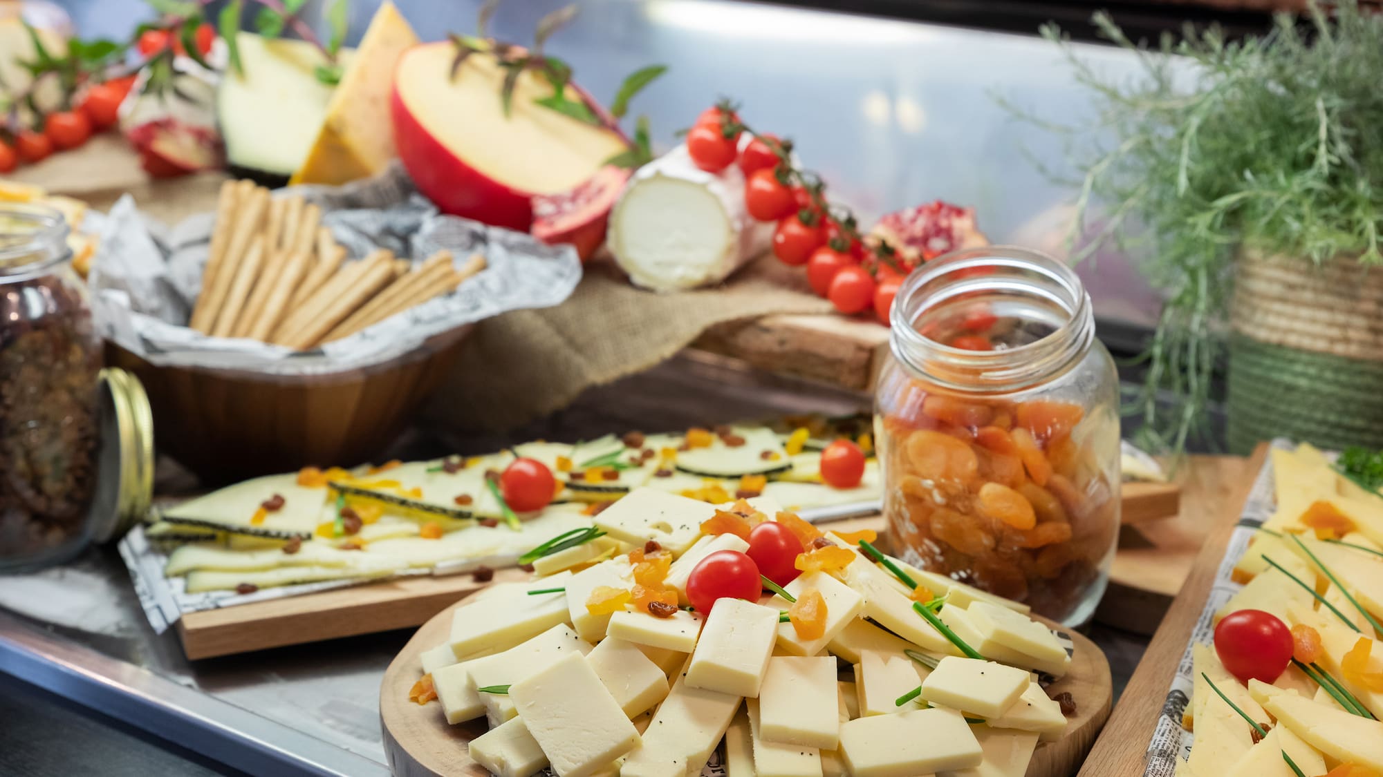 a plate of cheese and fruit