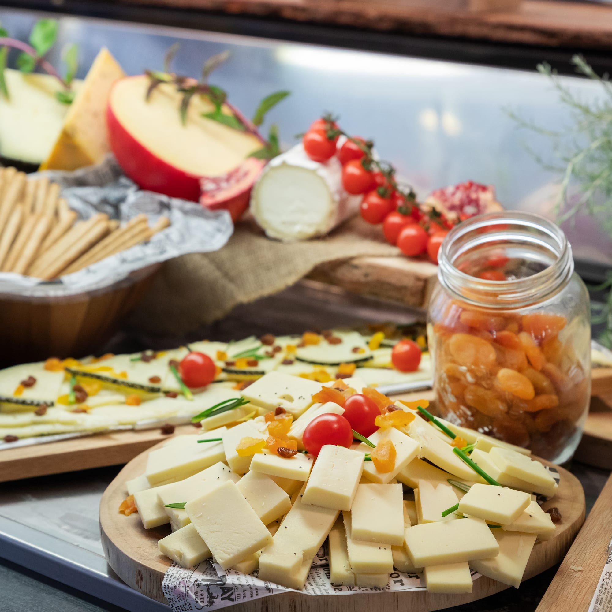 a plate of cheese and fruit