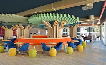 a room with tables and chairs