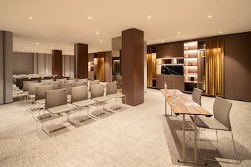 a room with chairs and a table