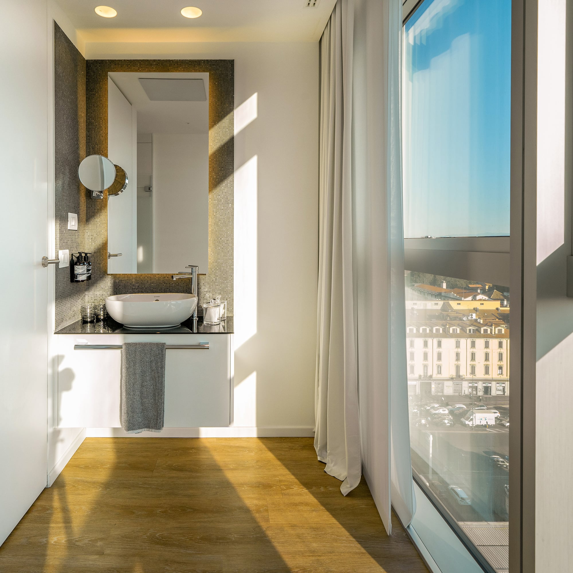 a bathroom with a large window