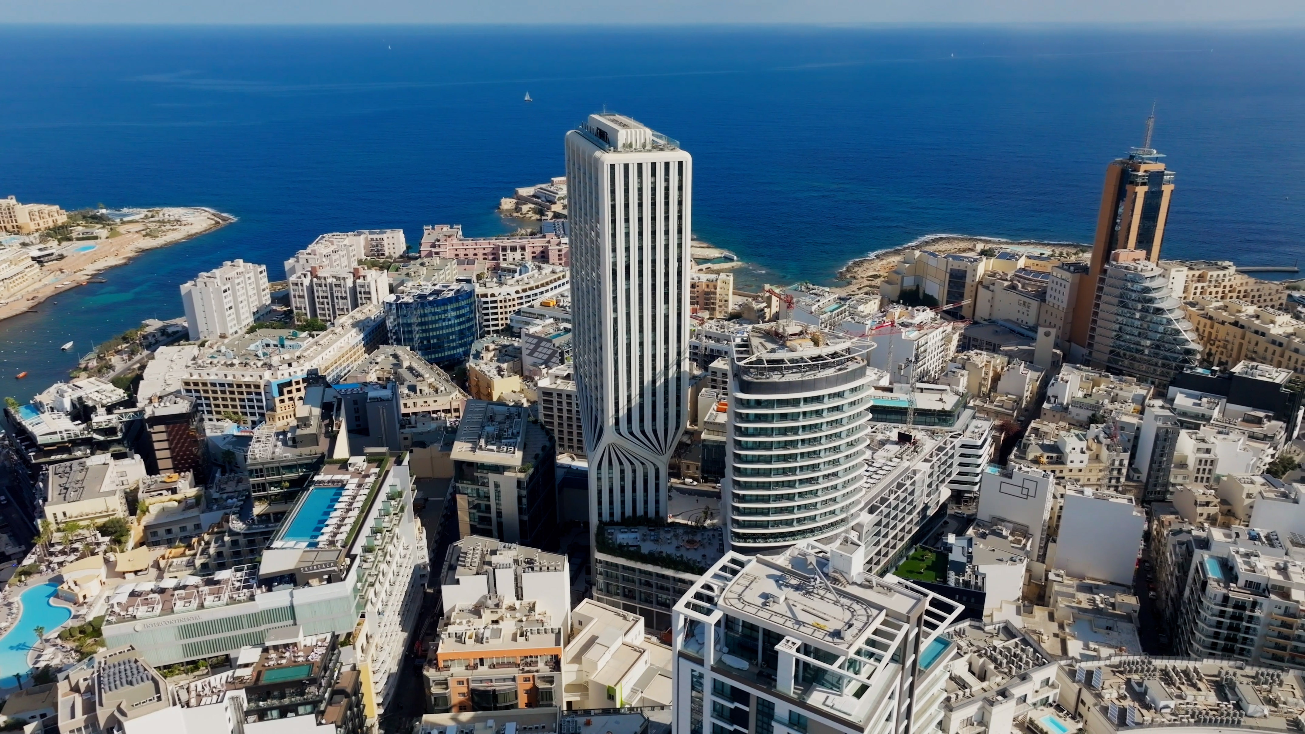 St Julian's, Malta cityscape: Mercury Towers, high-rises by Mediterranean Sea.