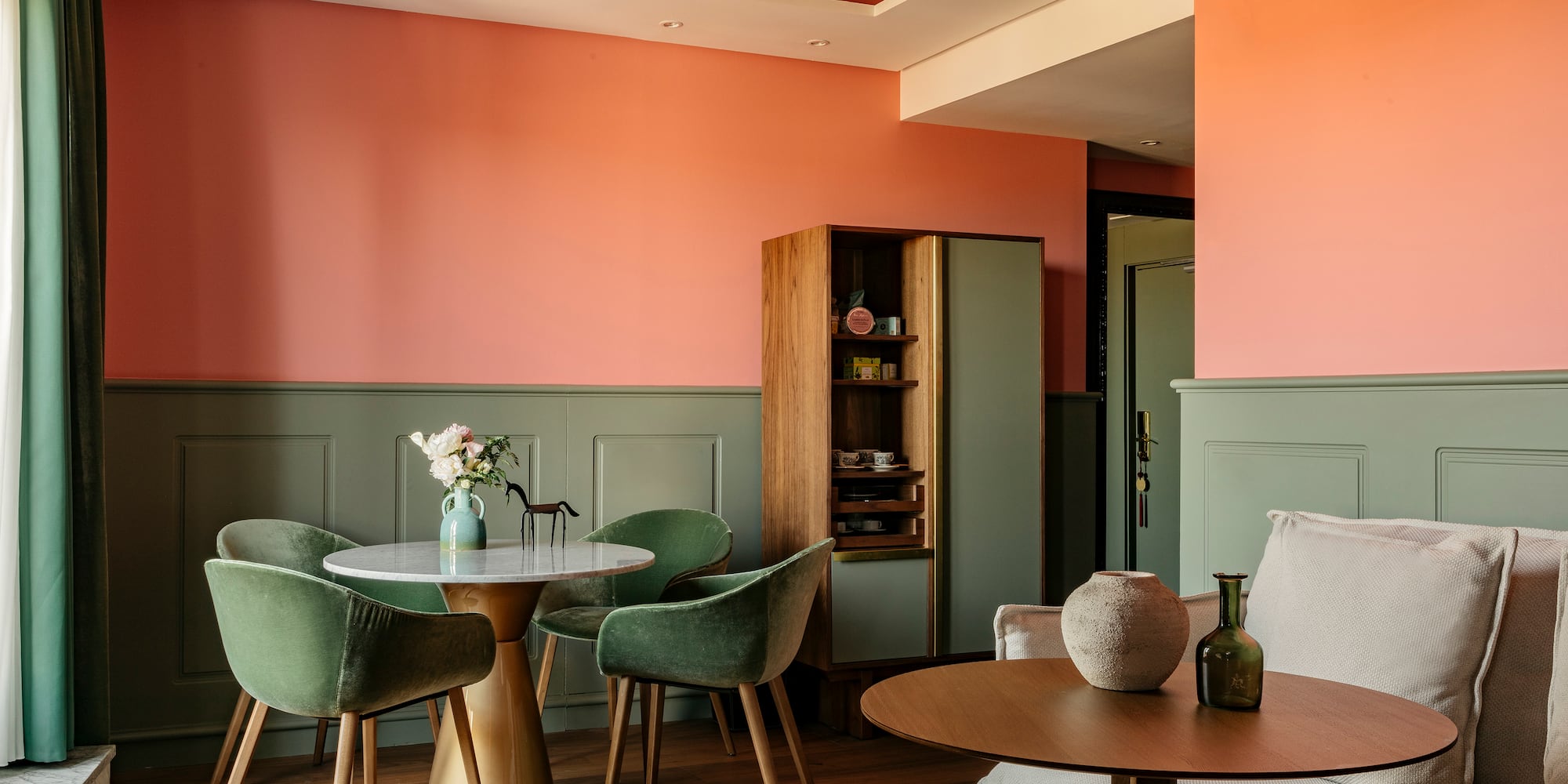 a room with a table and chairs