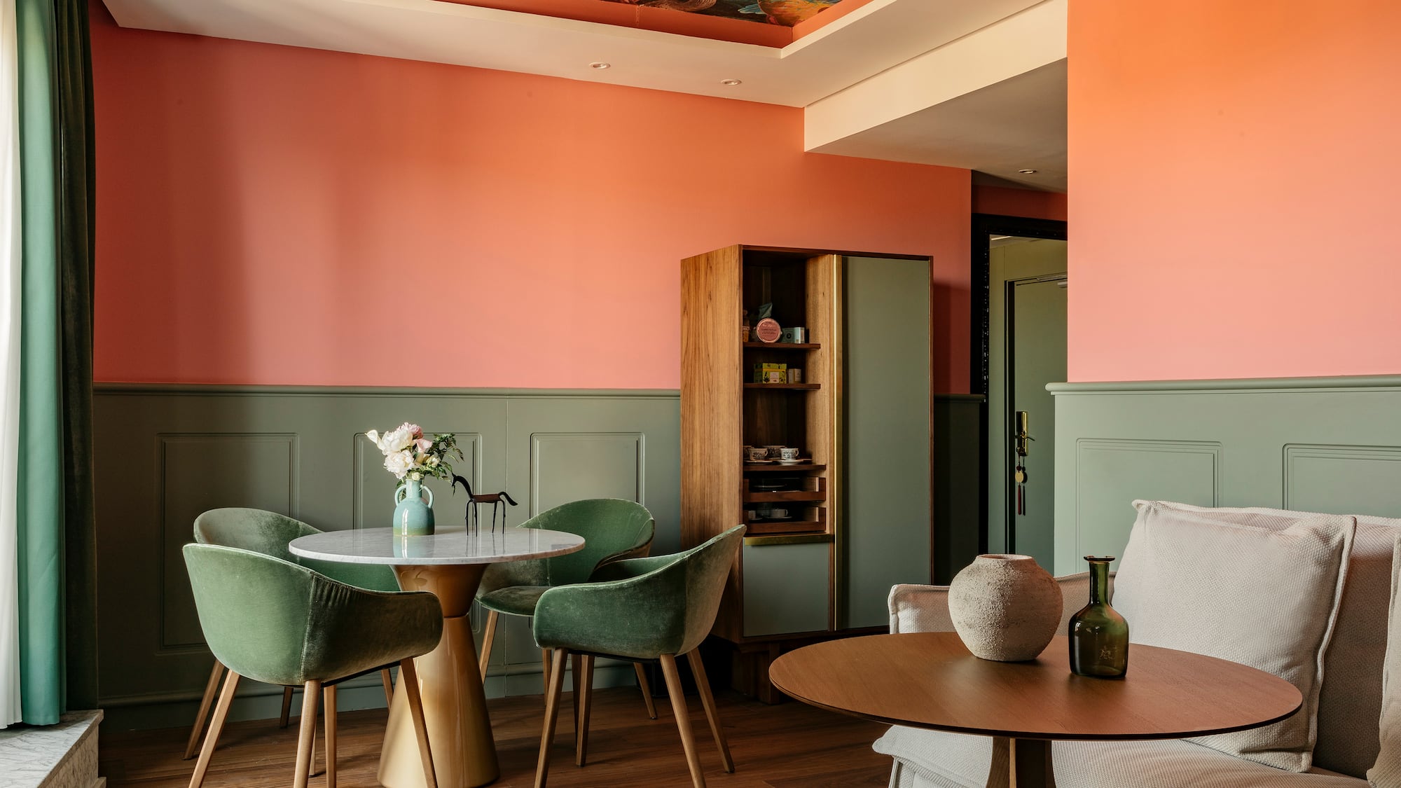 a room with a table and chairs