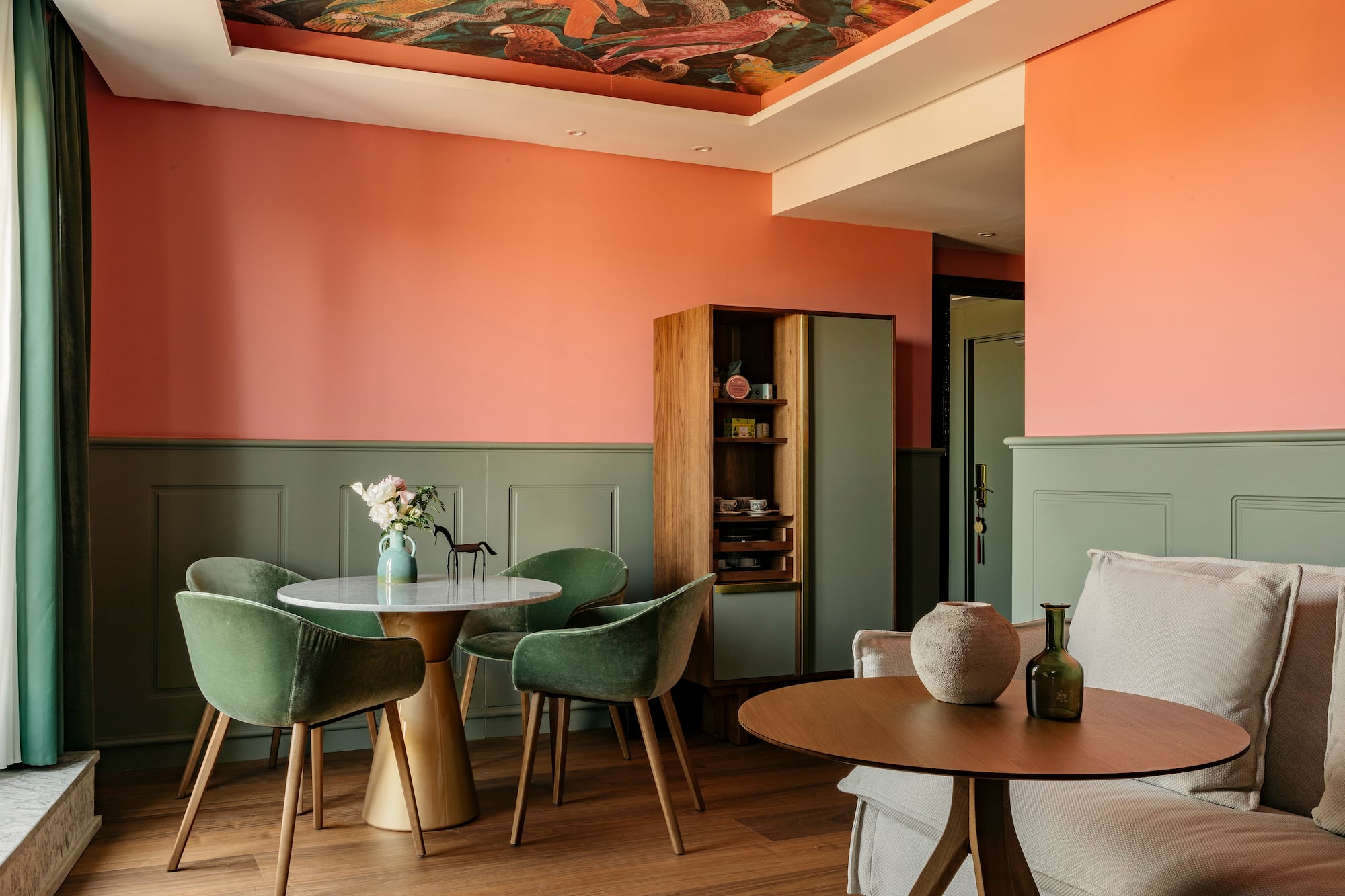 a room with a table and chairs