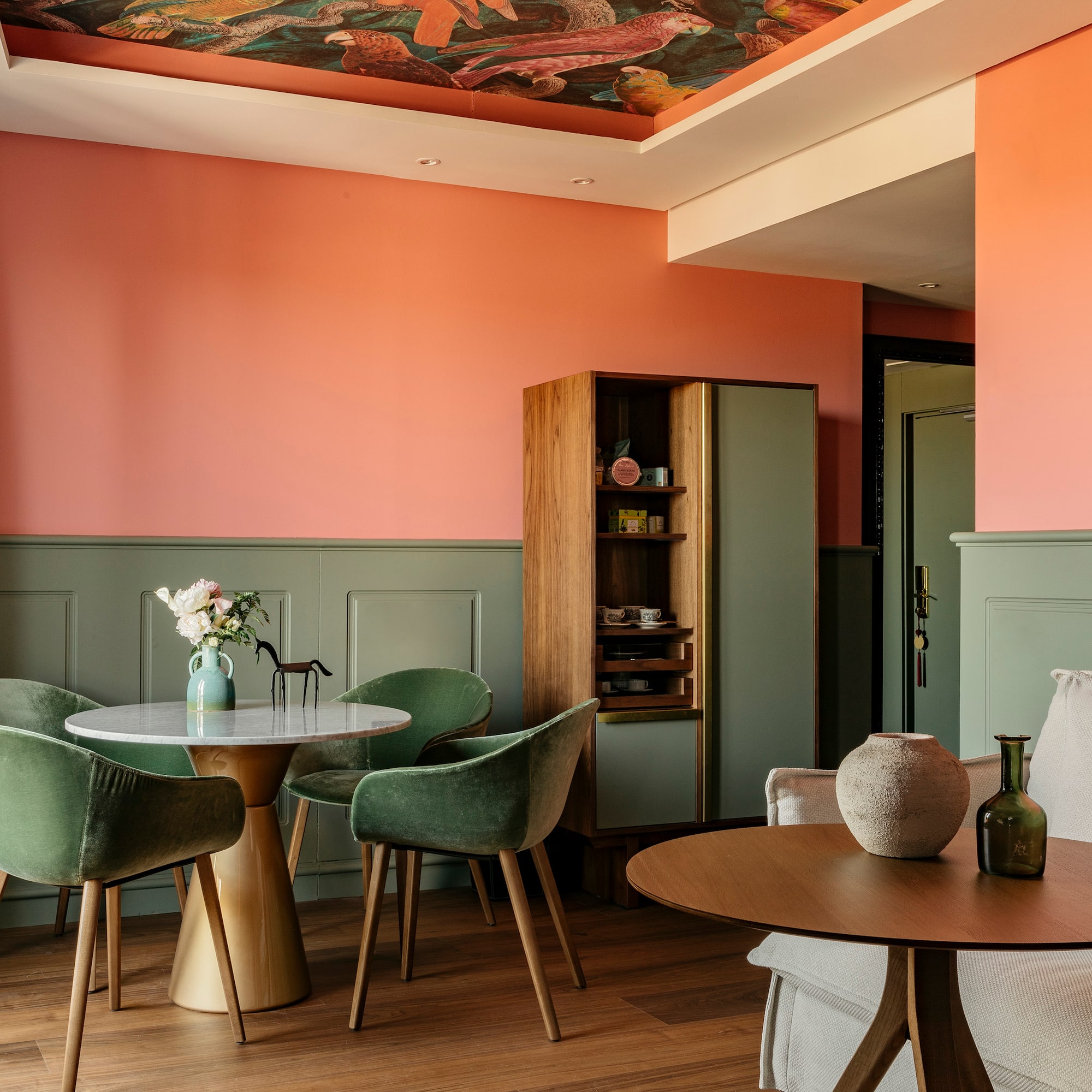 a room with a table and chairs