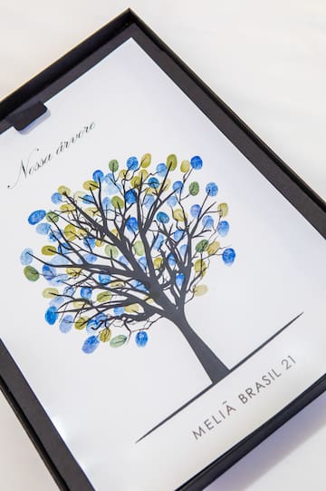 a picture of a tree with blue and yellow leaves