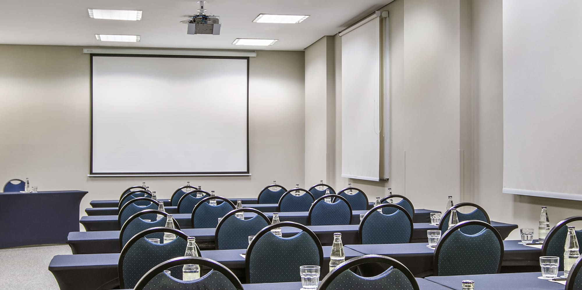 a room with tables and chairs