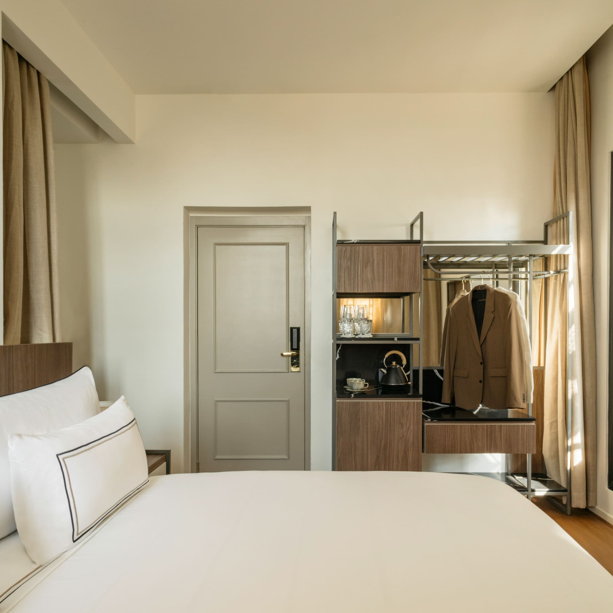 a room with a bed and a closet