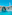 White sailboat in turquoise water near rocky cliffs and sea cave.