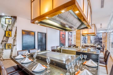 a restaurant with a large table set up