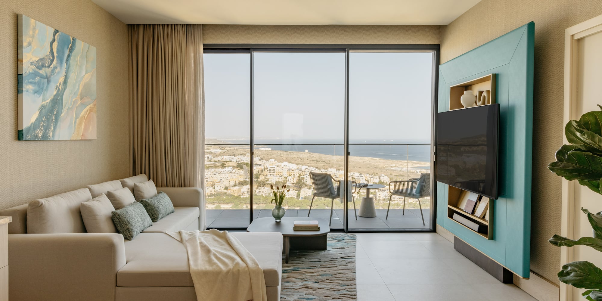 a living room with a large glass door