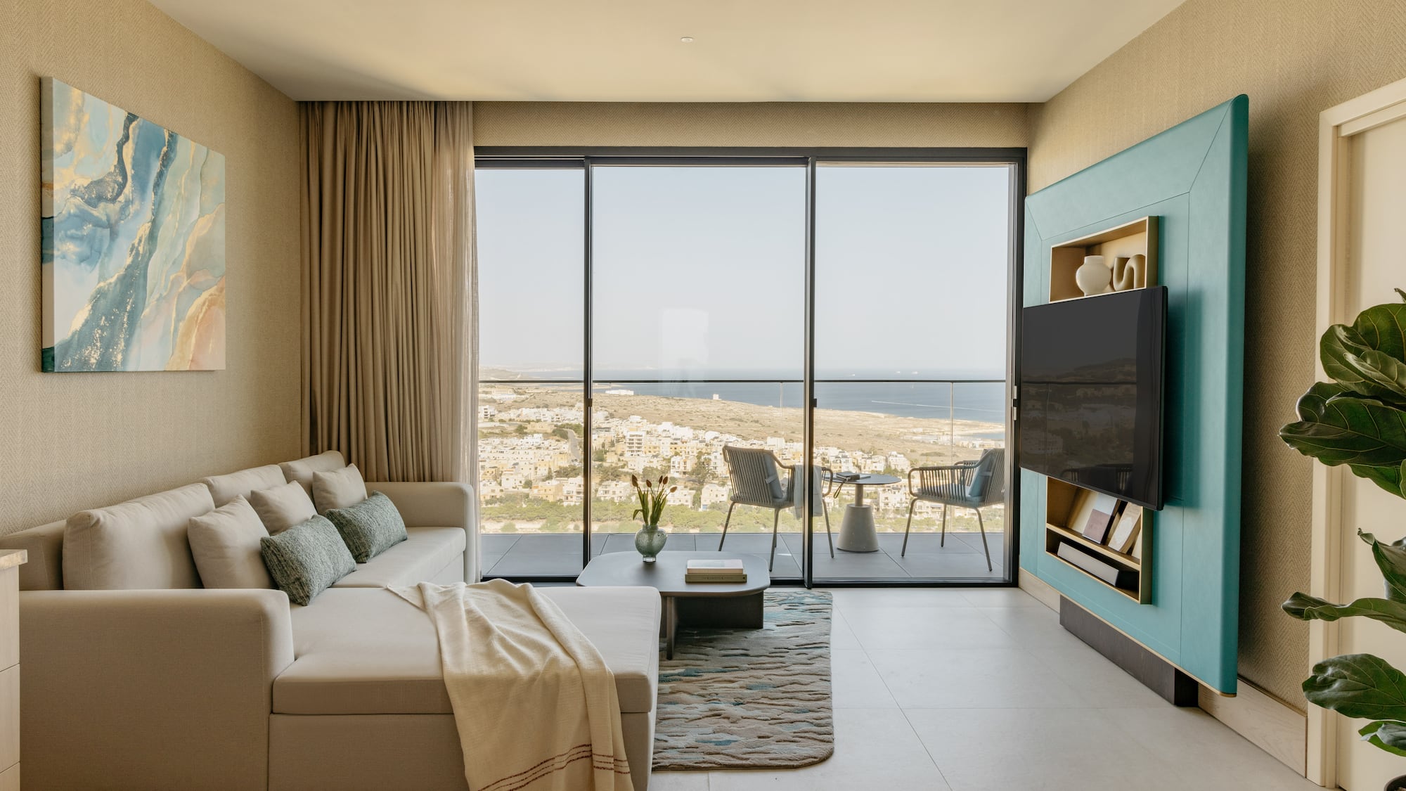 a living room with a large glass door