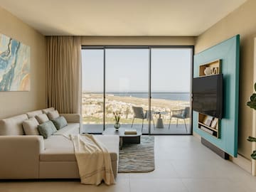 a living room with a large glass door