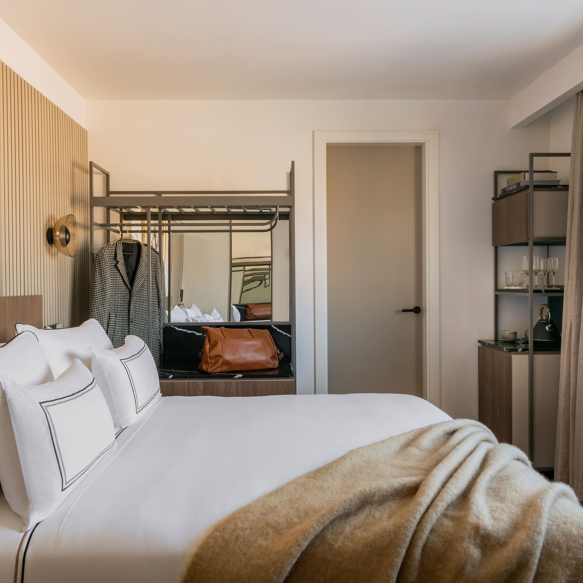 a bed with a blanket in a room