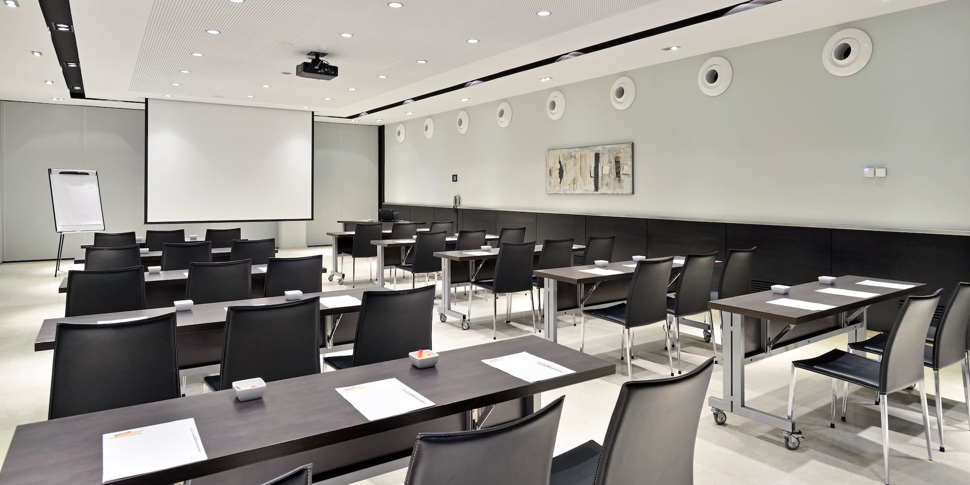 a room with tables and chairs