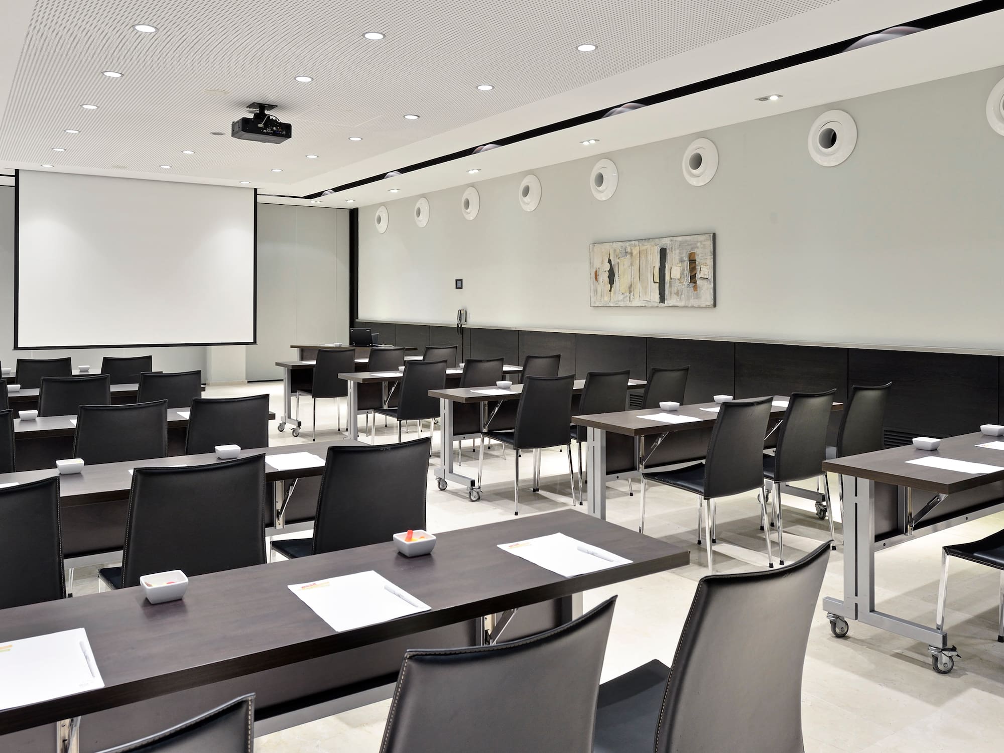 a room with tables and chairs