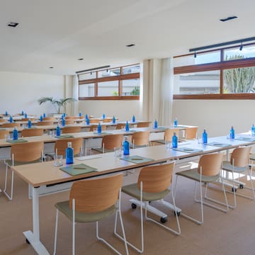 a room with tables and chairs