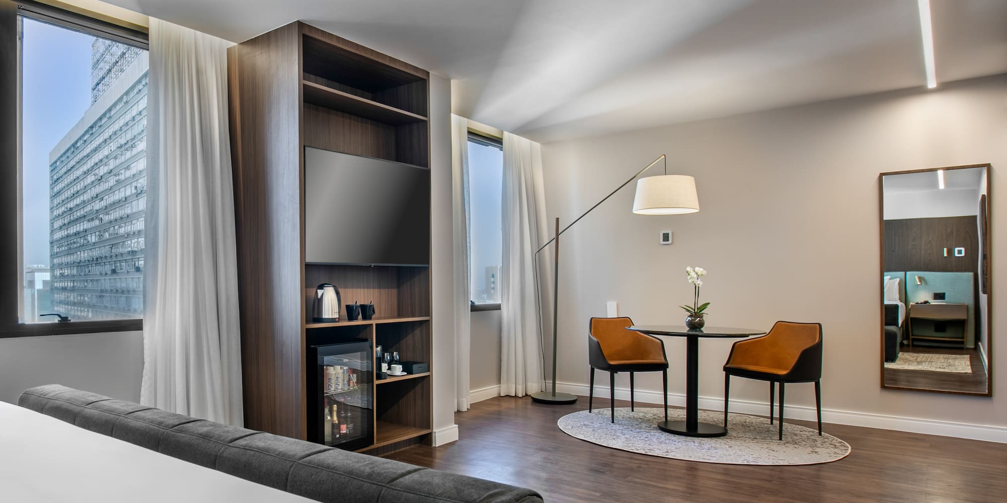 a room with a tv and a table