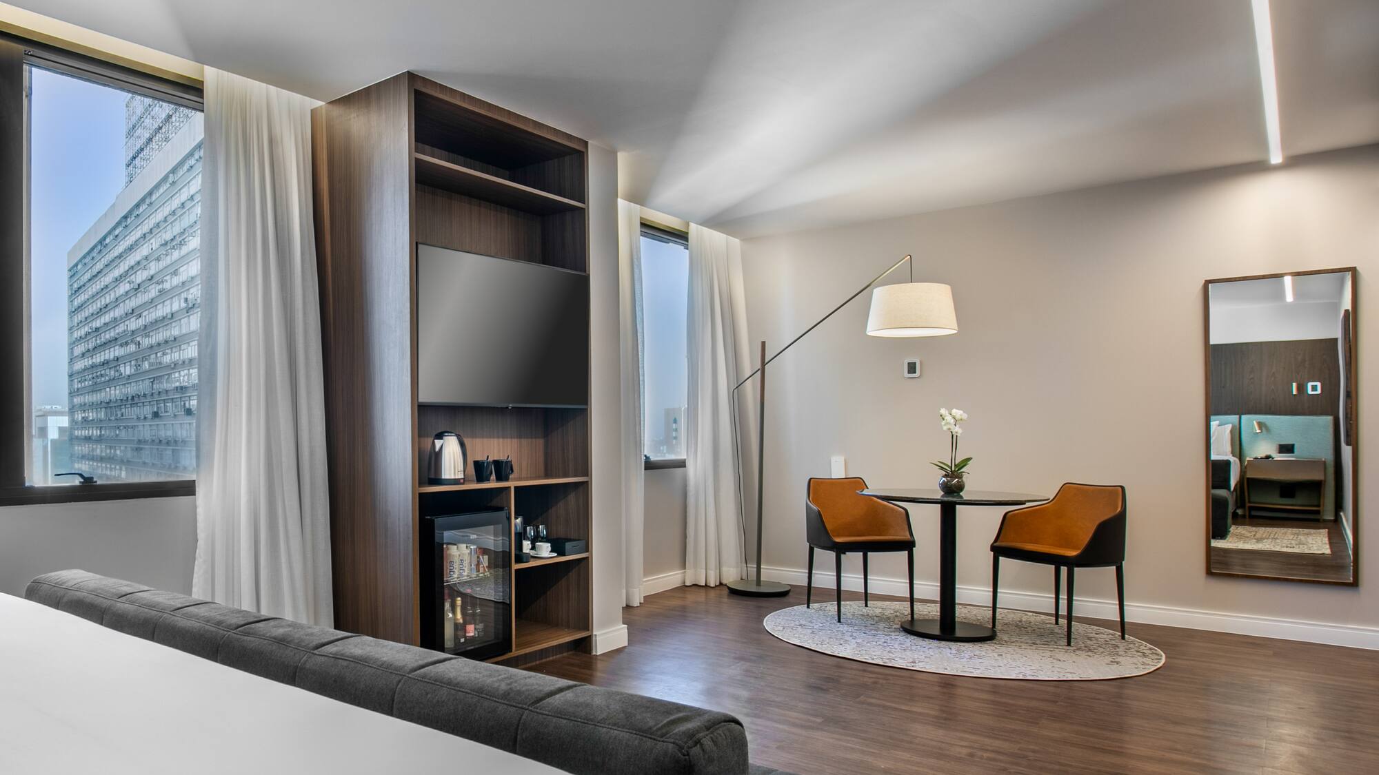 a room with a tv and a table