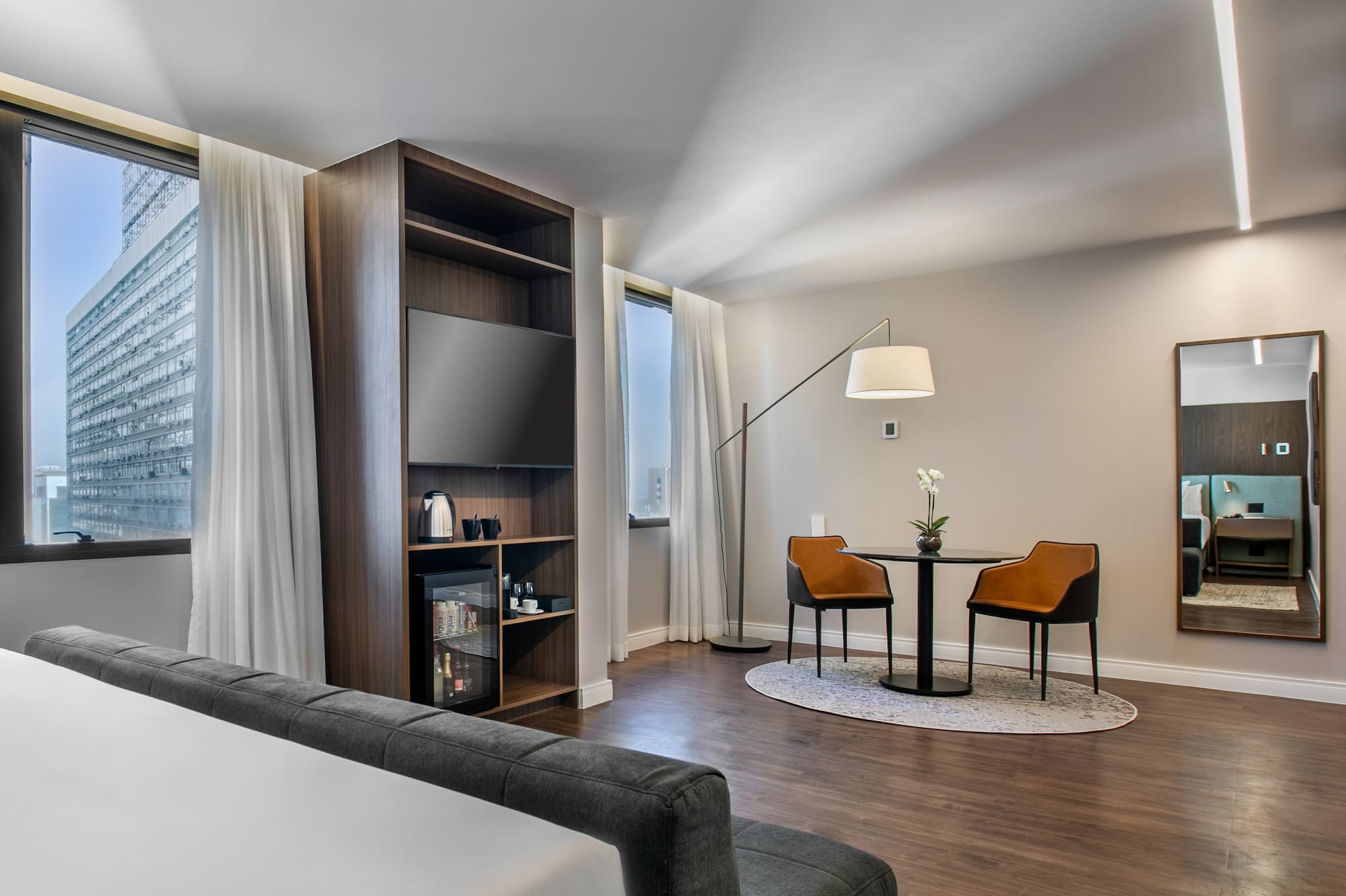 a room with a tv and a table