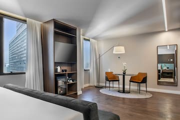 a room with a tv and a table