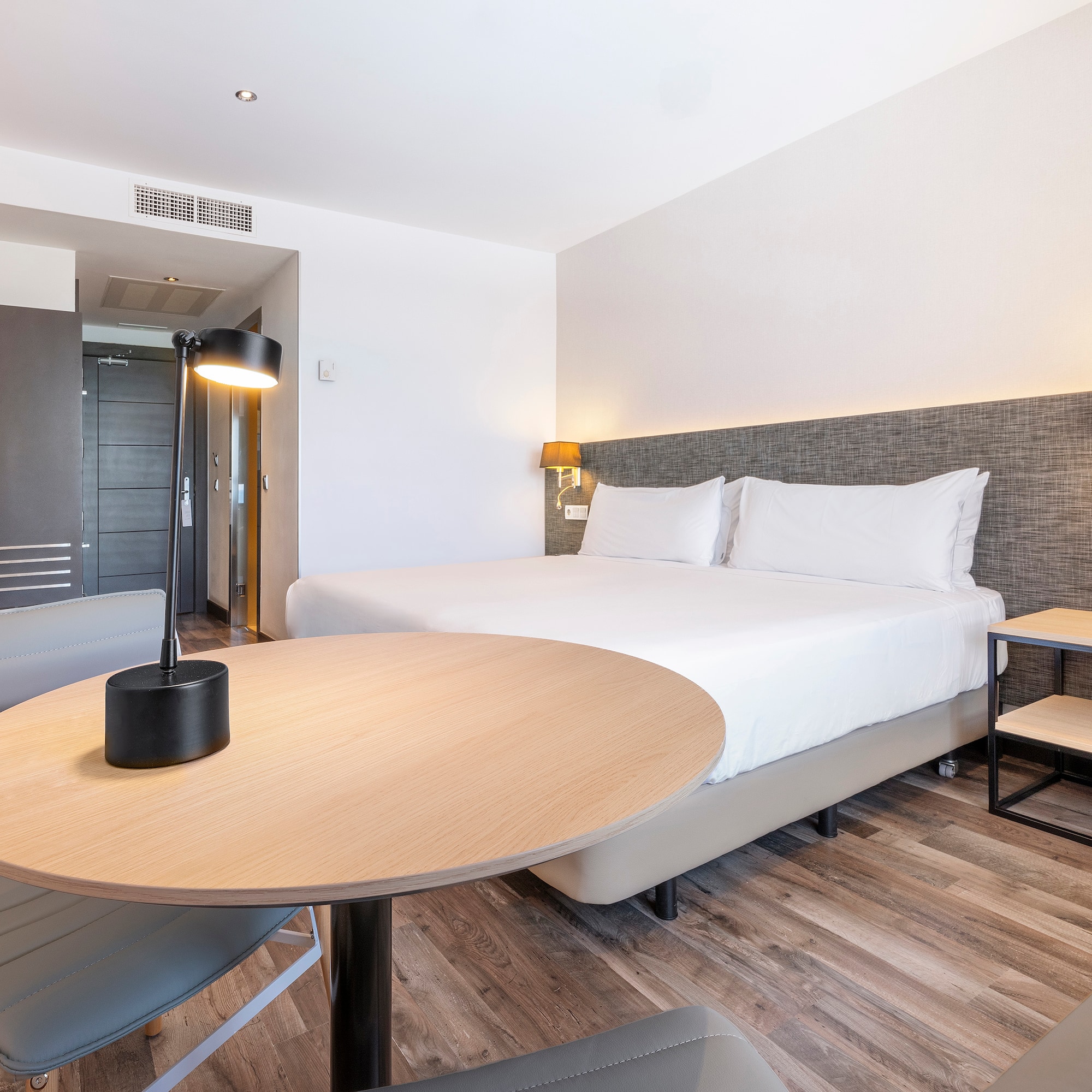 a room with a bed and a table