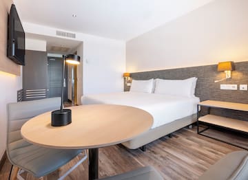 a room with a bed and a table