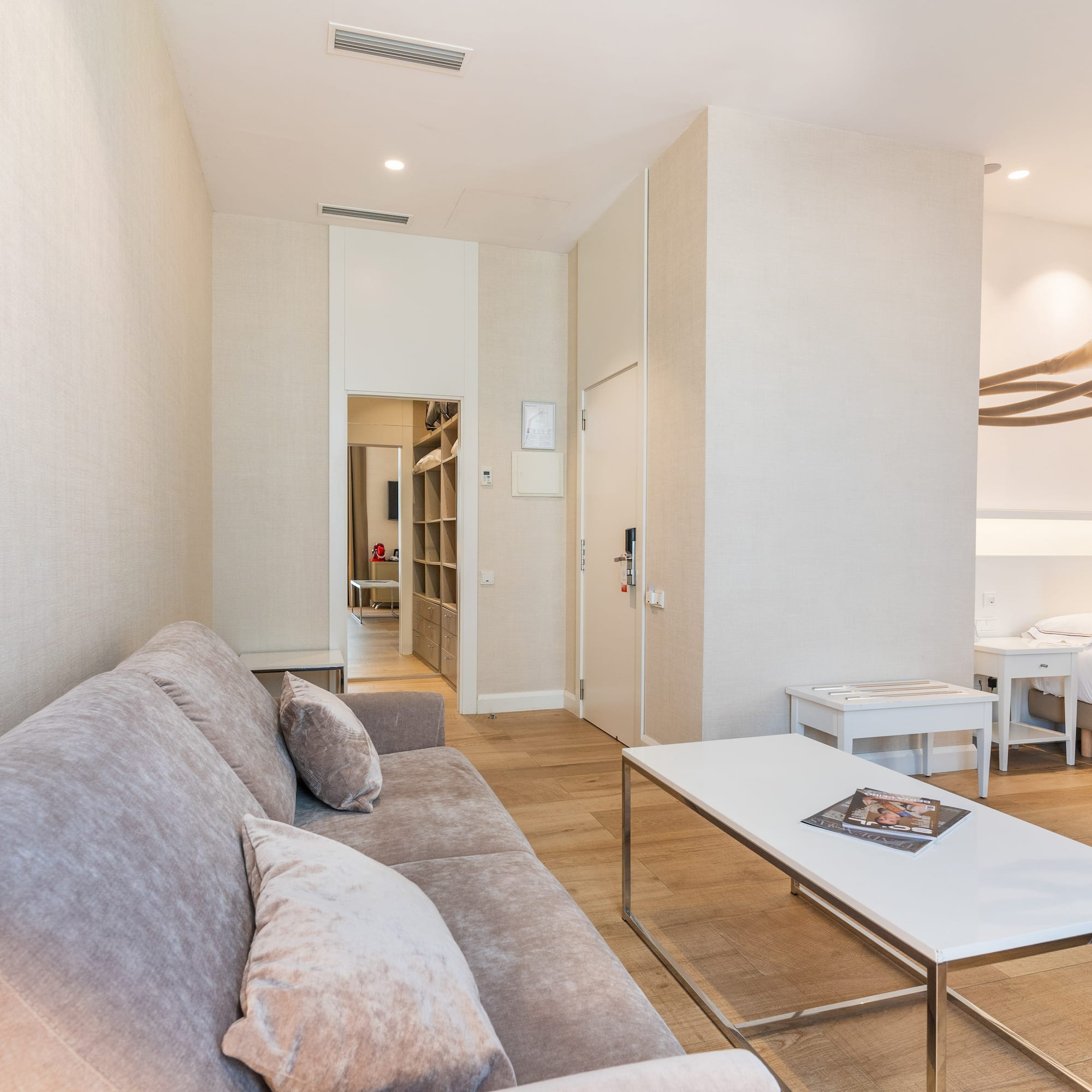 a living room with a couch and a coffee table